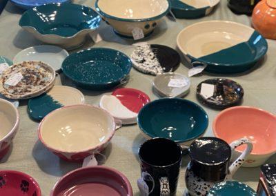 pottery pieces laid out on table