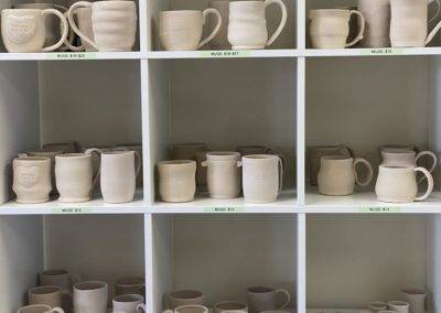 bisque pottery in shelves