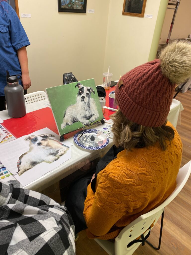 person painting their dog